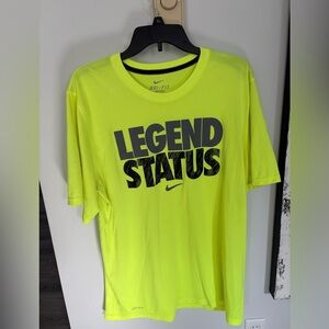 Nike Dri-Fit T-shirt. Has Legend Status on front. Neon type color.